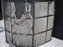 dusty air filter, taken out to be cleaned